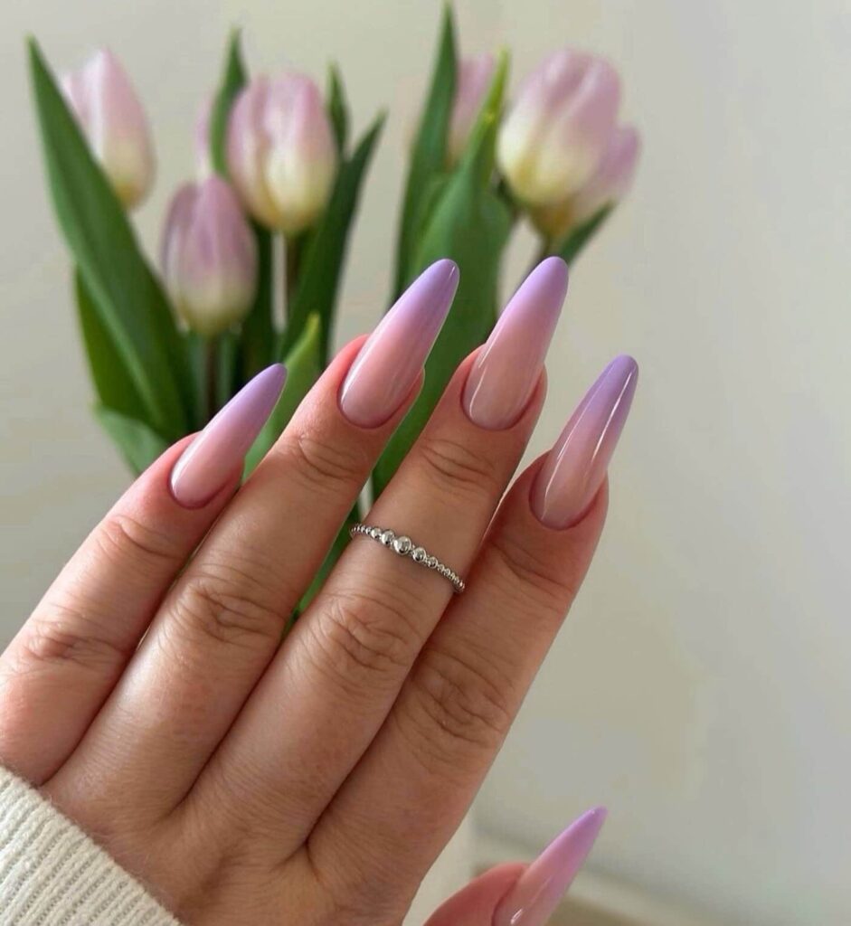 Purple ombre nails in almond shape