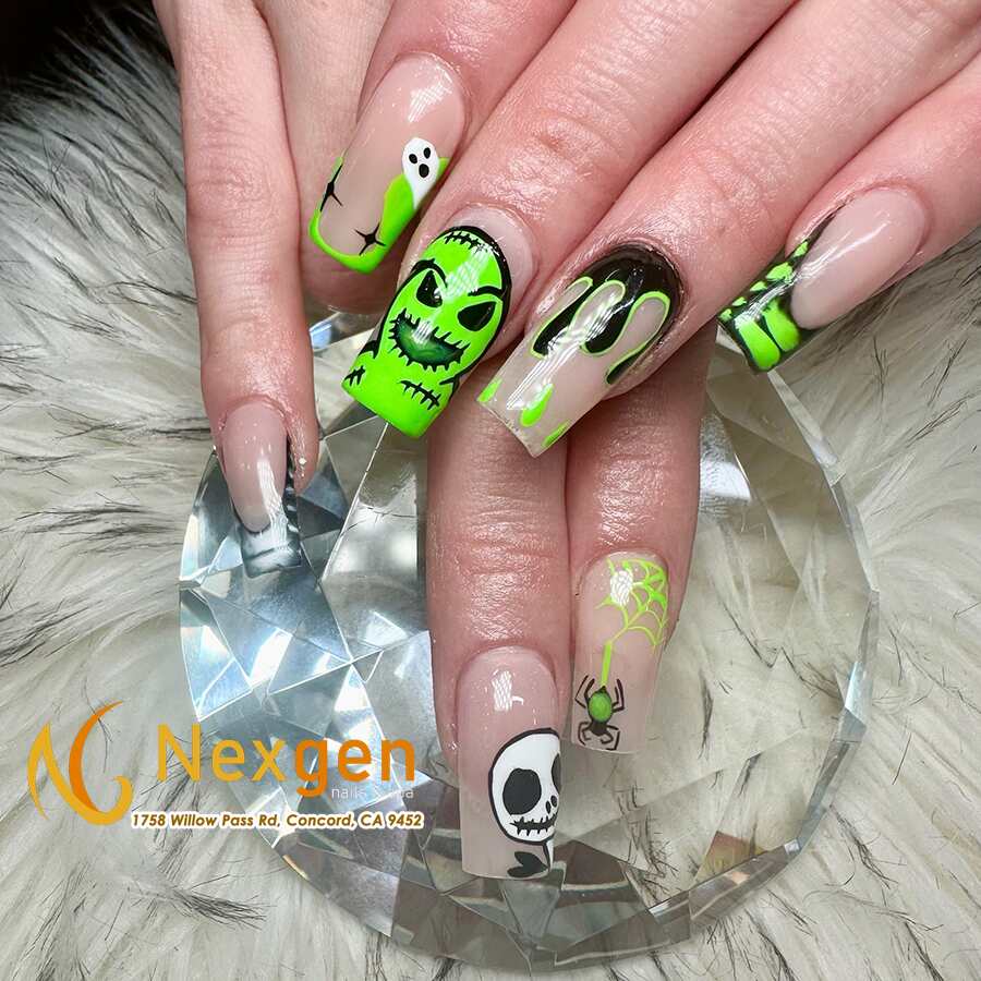 black and green acrylic Halloween nail art