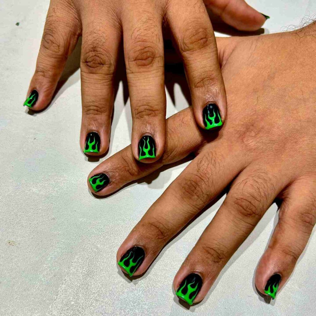 bright green flame nail art on short black nails