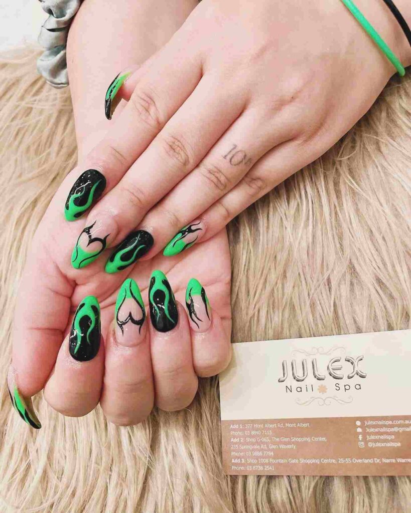 Neon green and black heart nails