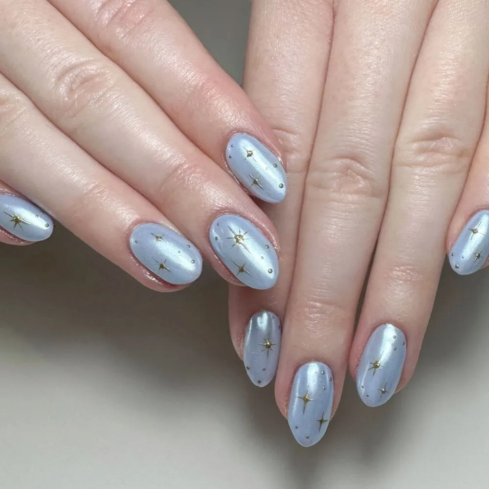 Blue chrome nails with stars