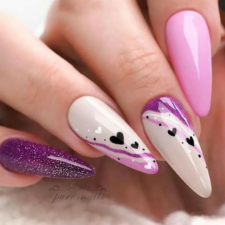 Stiletto shaped nails with heart