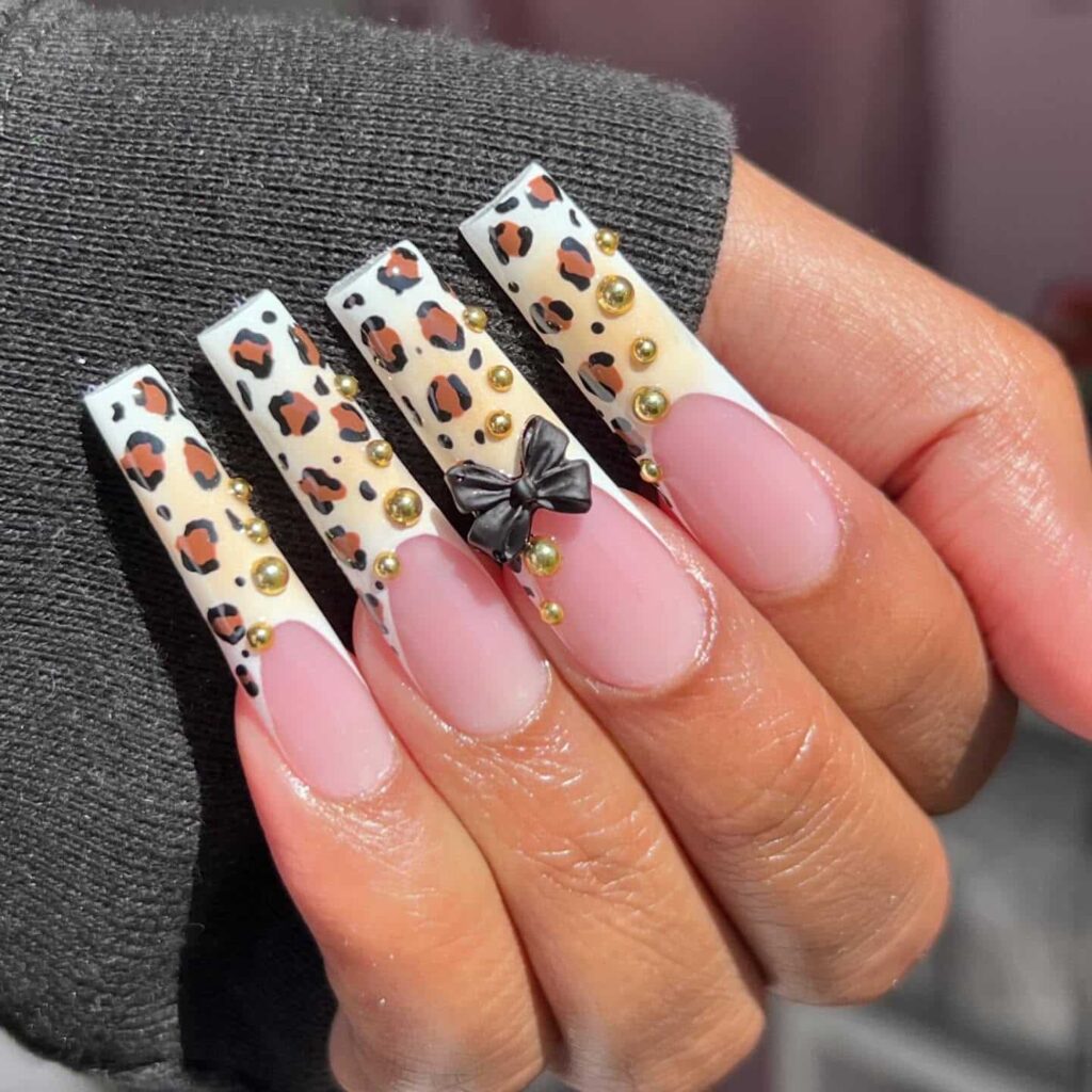 cheetah print nails with bow