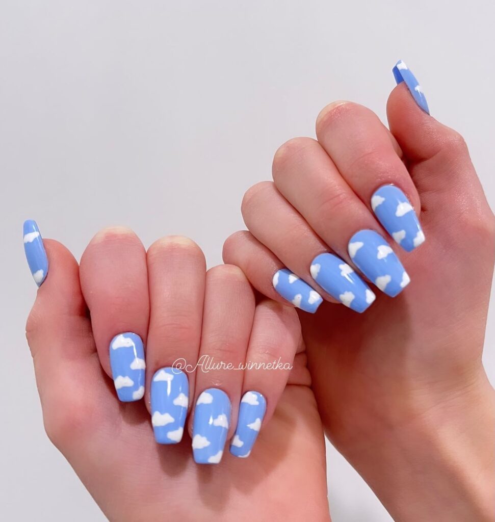 cloud nail art on coffin shaped nails