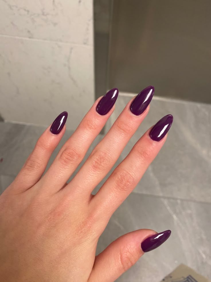 Deep plum almond nails