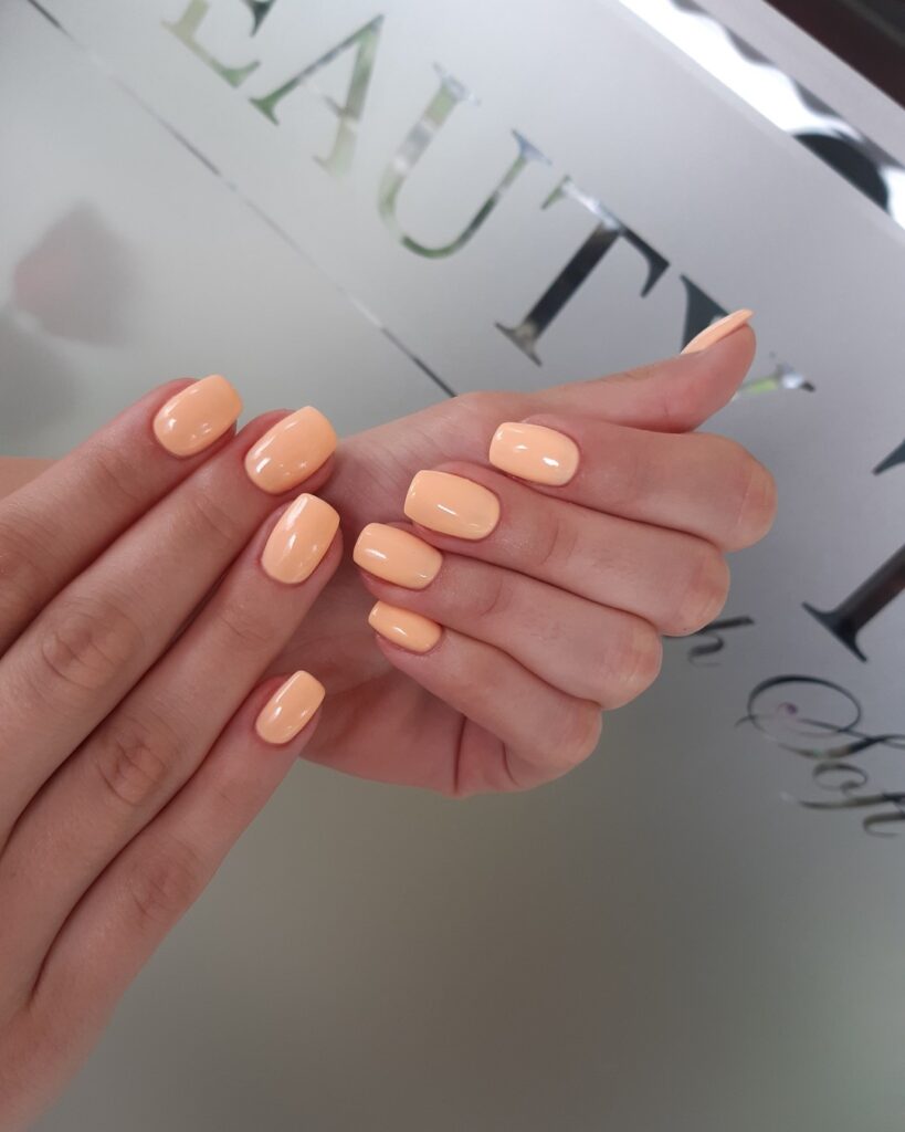 Pastel orange nails