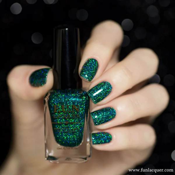 Holographic manicure in green