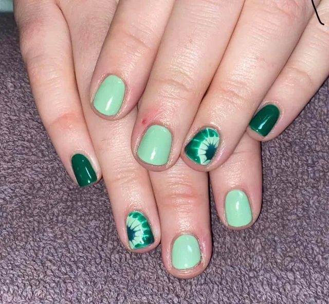 green tie dye nails