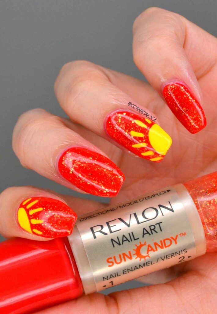 Bright orange and yellow sun nail art