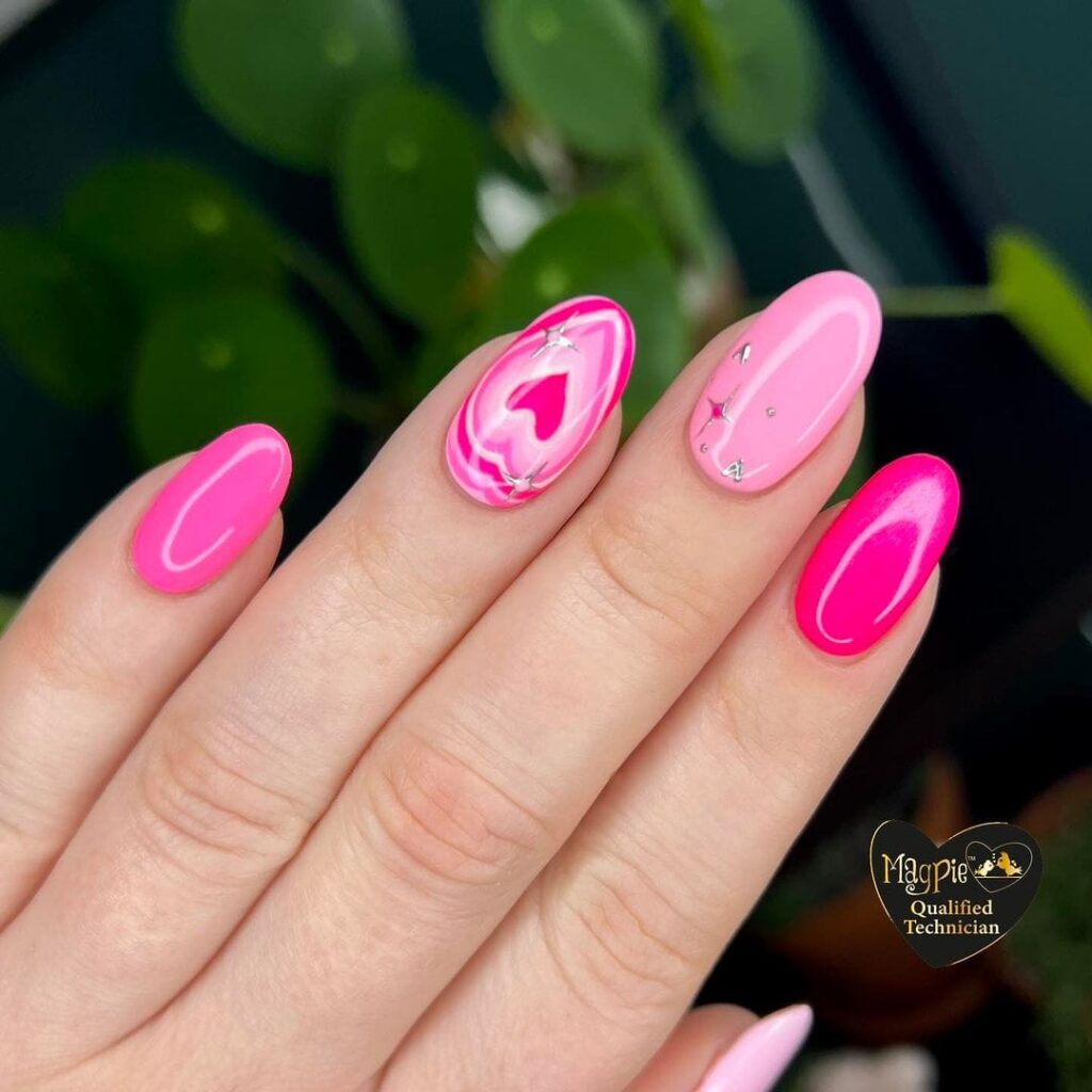 Bright pink abstract heart nails