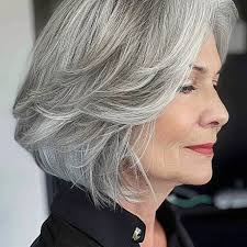 Cream blush on older women having grey hair
