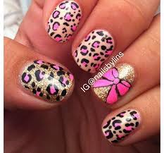 Leopard spots and ribbon nail art design