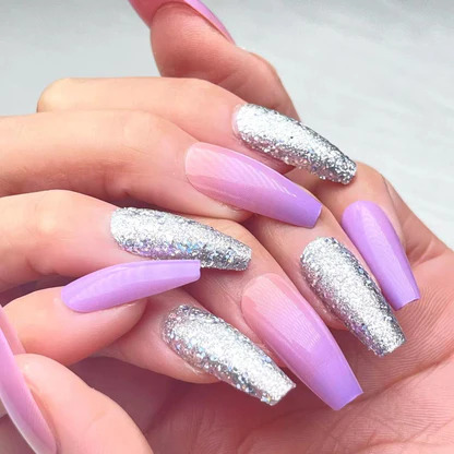 Long coffin press-on nails with a mix of soft purple ombré and full silver glitter designs
