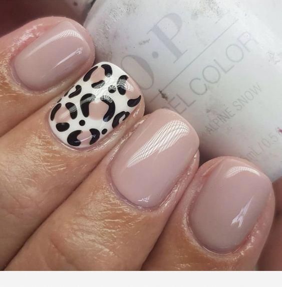 Nude leopard print nails