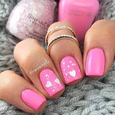 Pink and white splatter heart nails