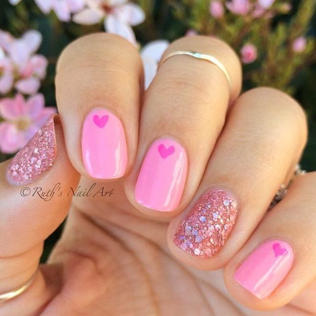 Pink glitter nails with hearts