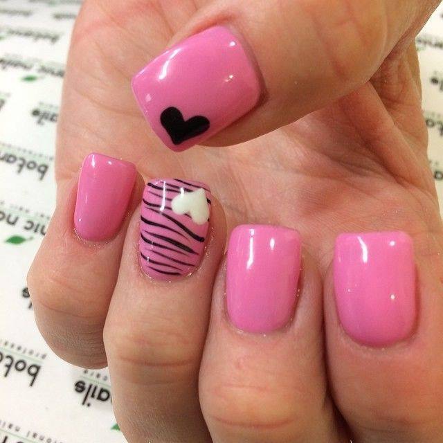 Pink nails with black heart