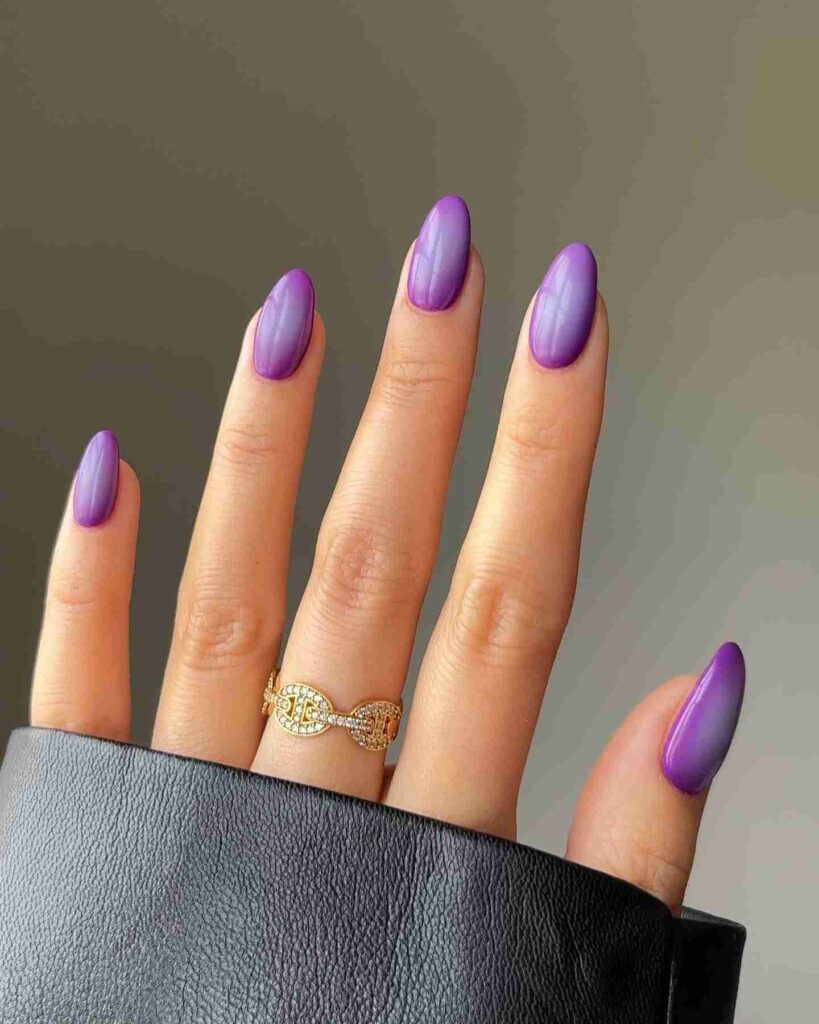 Purple aura almond nails