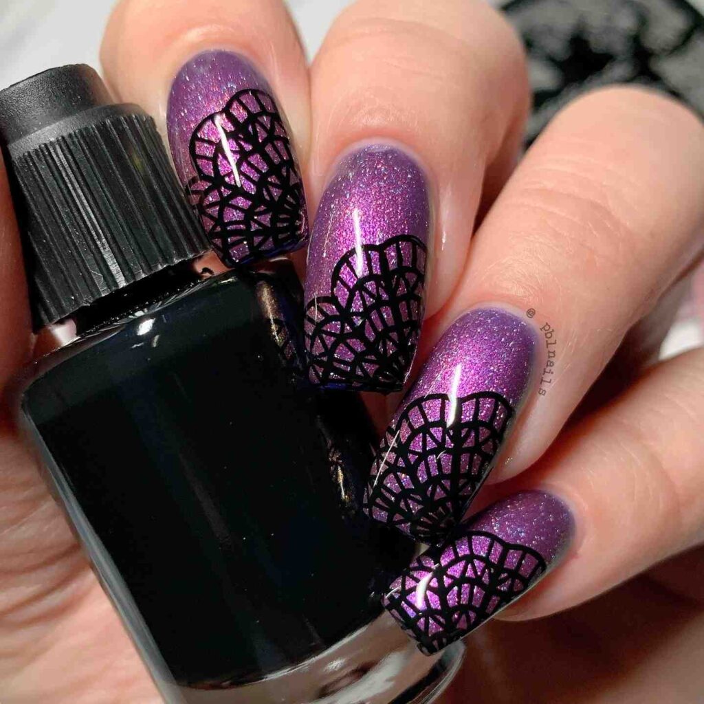 Purple glitter nails with butterfly art