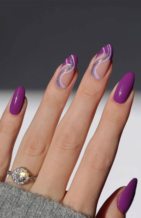 Purple glitter swirl nail design