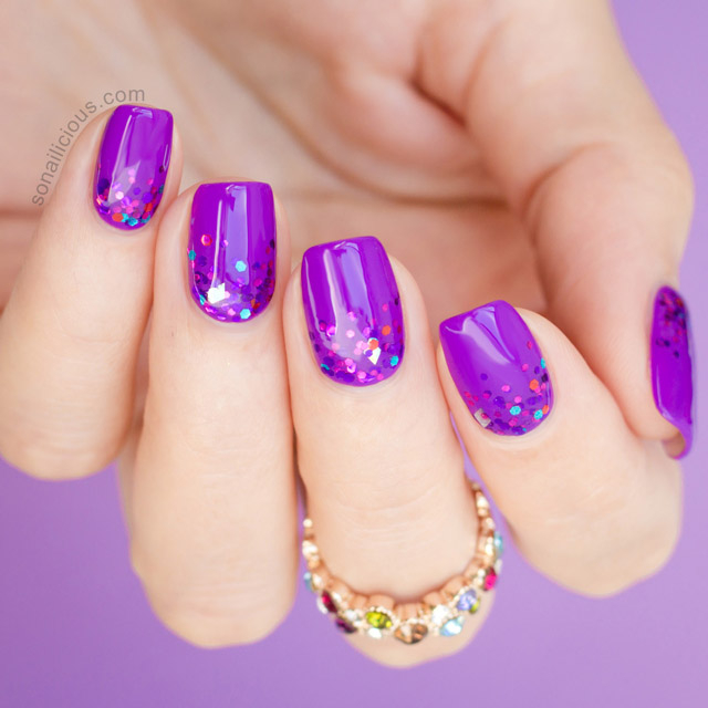 Purple nails with chunky glitter