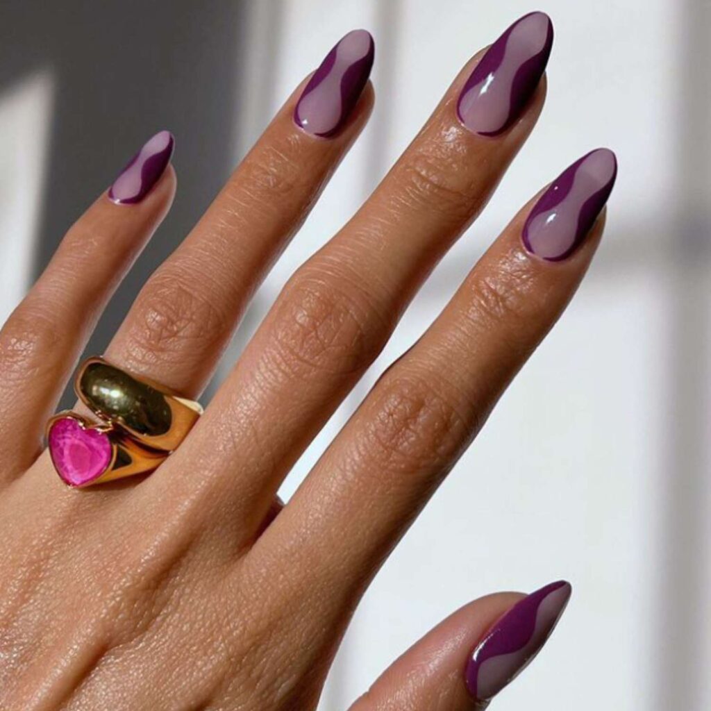 eggplant color swirl nail designs