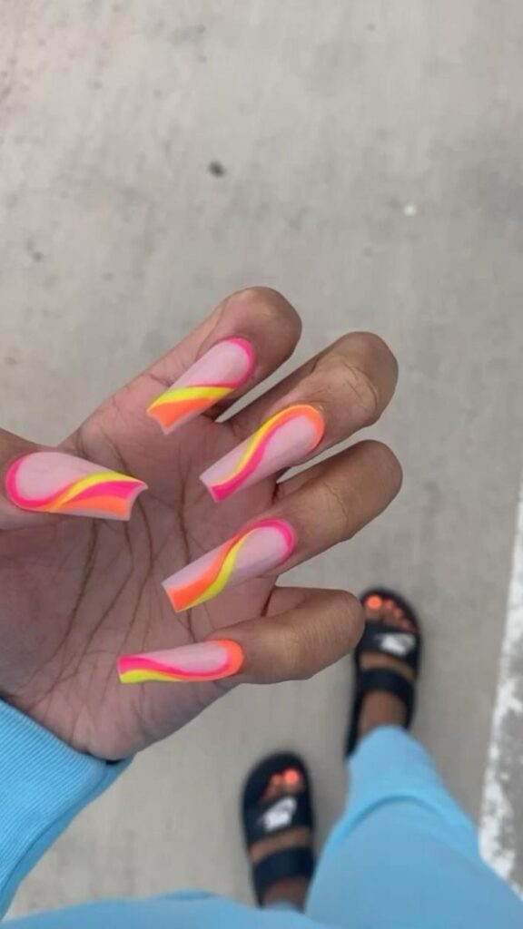 neon swirls over nude nail polish