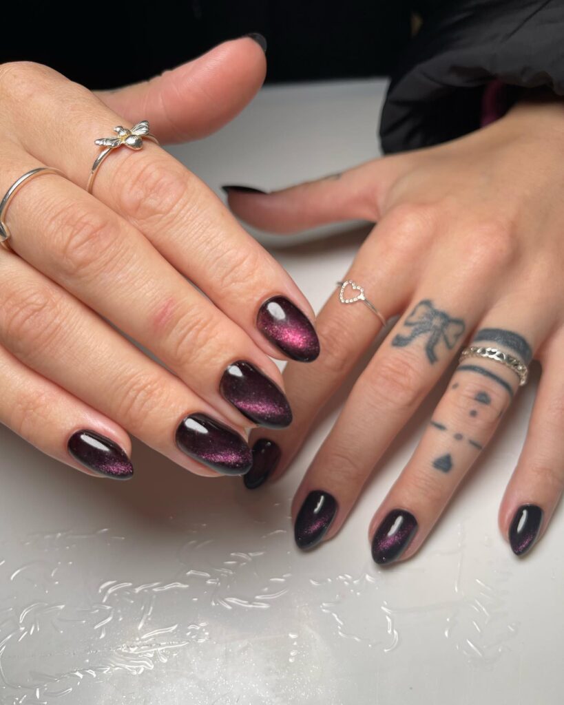 Plum cat eye nails