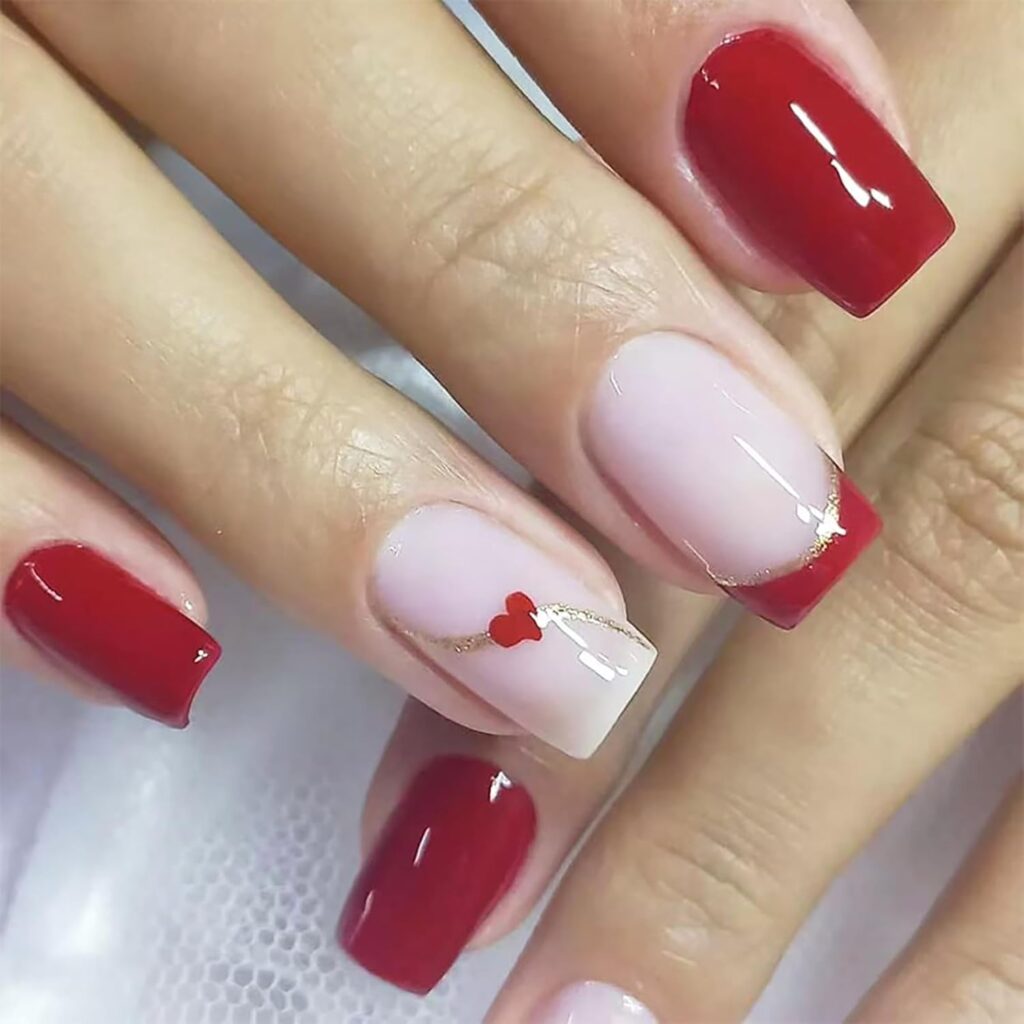 Heart accent red nail design
