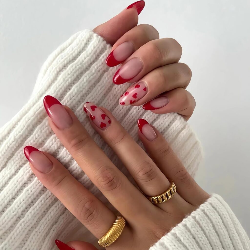 Red french tip and heart accent nails